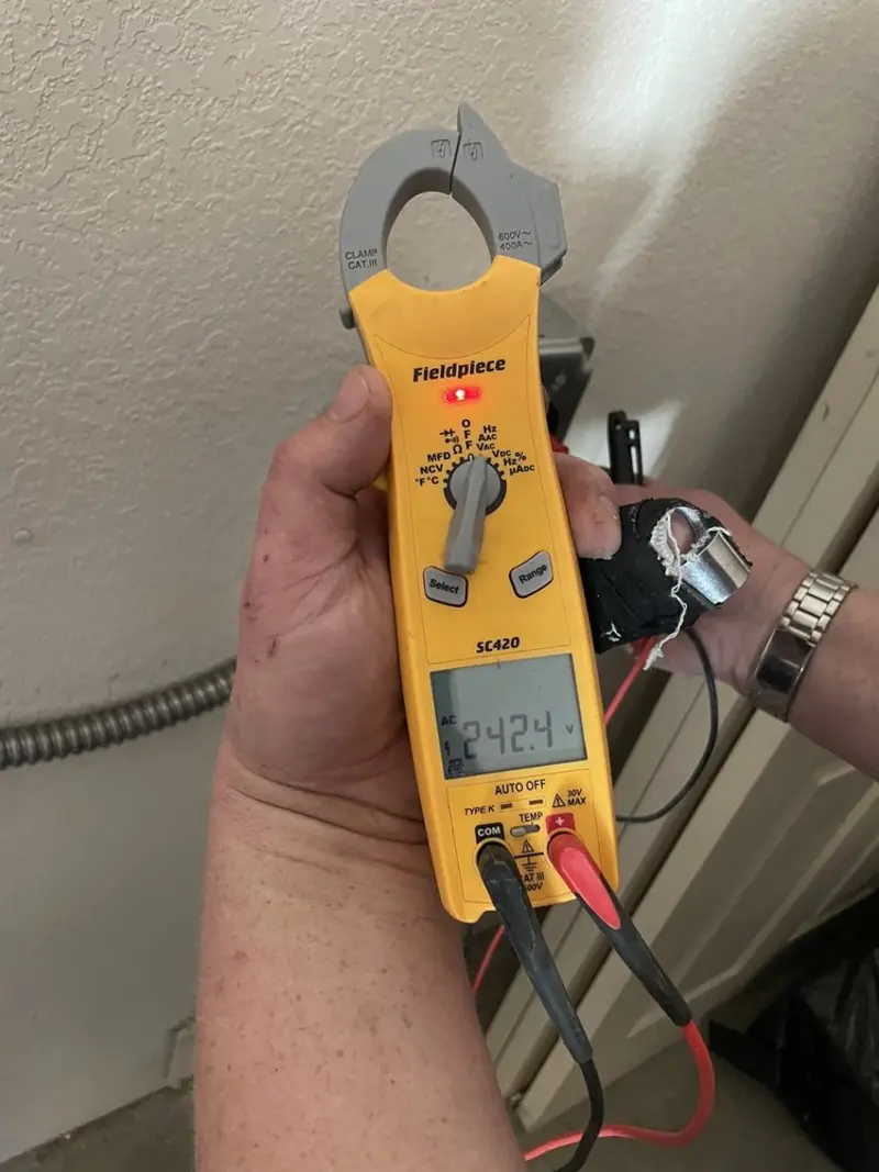 Voltage testing with clamp meter during Aluminum Wiring Replacement in Bowling Green